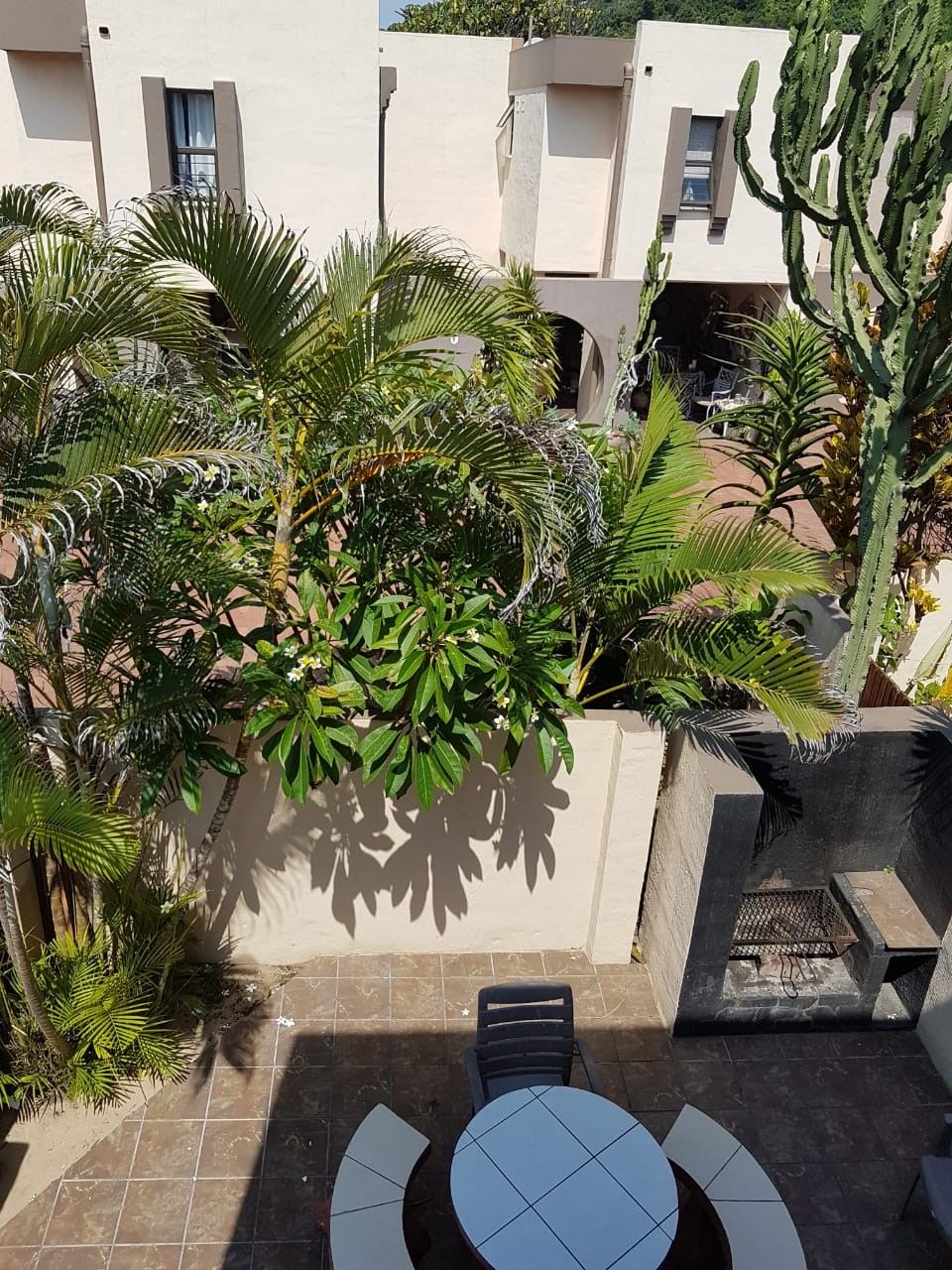 Balcony with braai and garden view